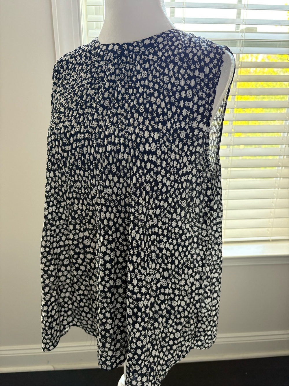 Sleeveless Dark Blue A-Line Shirt with White Floral Print